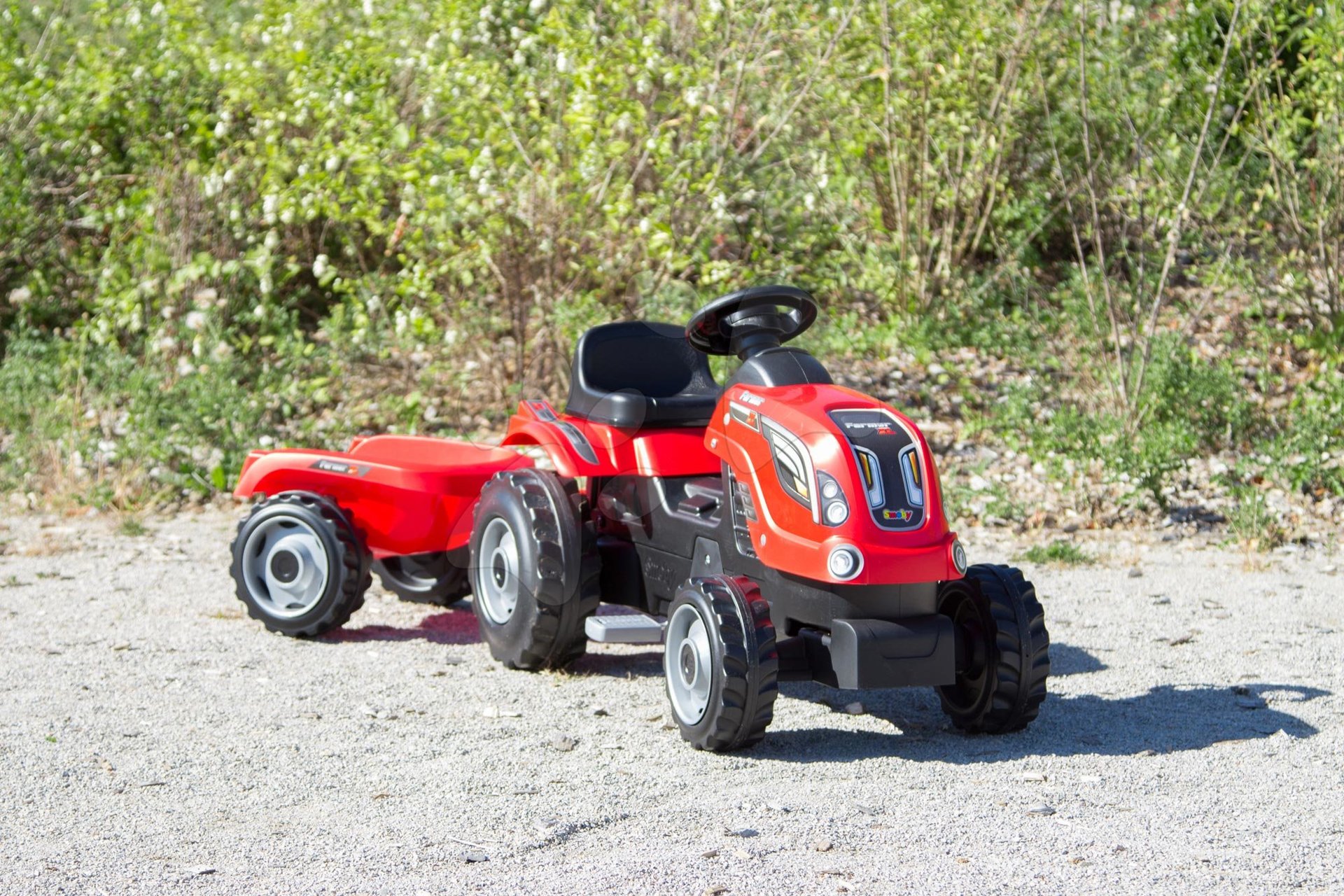 Dětský traktor s přívěsem Smoby červený