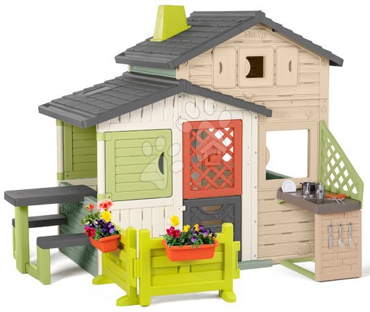 Speziell nur bei uns  | Seite 3 - Spielhaus Evo Grün Smoby mit ökologischer Ecke im Gartenbereich neben der Küche in natürlichen Braun-Tönen