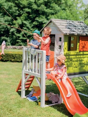 Hračky pre dievčatá - Set domček na pilieroch Pilings House Smoby s 150 cm šmýkľavkou a odrážadlo s gumenými kolesami a vozík s vedrom a zmrzlinou od 24 mes_1