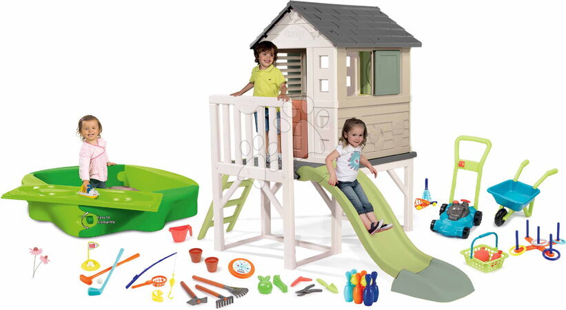 Kerti játszóházak homokozóval - Szett házikó pilléreken és homokozó talicskával és fűnyíróval House On Stilts Life Smoby