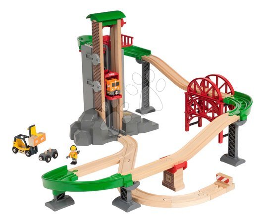 Holzeisenbahnen BRIO - Drevená vláčikodráha s výťahom a skladom Lift&Load Warehouse Set BRIO