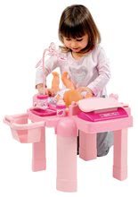 Domečky pro panenky - Přebalovací stolek pro panenku Nursery Écoiffier s kuchyňkou a koupelnou s 22 doplňky růžový od 18 měsíců_1