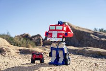 Autos mit Fernsteuerung - ferngesteuertes Spielzeugauto und Roboter RC Optimus Prime 2v1 Transformers Jada mit Ton und Licht_23