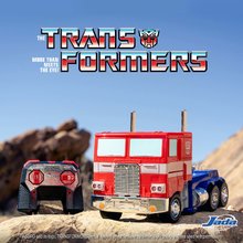 Mașini cu telecomandă - Mașină de jucărie cu telecomandă și robot RC Optimus Prime 2v1 Transformers Jada cu sunete și lumini_26