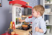Elektronické kuchyňky - Kuchyňka rostoucí s tekoucí vodou a mikrovlnkou Tefal Evolutive Gourment Smoby se židlí a stolečkem_13