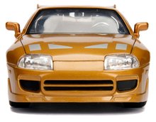 Játékautók és járművek - Kisautó Toyota Supra 1995 Fast & Furious Jada fém nyitható részekkel 18 cm 1:24_0