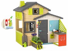Kleine Spielhäuser für Kinder - Spielhaus der Freunde mit einem Blumentopf neben der Küche in eleganten Farben  Friends House Evo Playhouse Smoby Erweiterbar_1