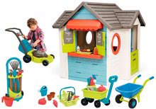 Spielhäuser mit Werkzeug - Set Häuschen mit Gartenrestaurant Chef House DeLuxe Smoby und ein Rasenmäher und ein Wagen  mit einem Eimer und Gartengeräten_37
