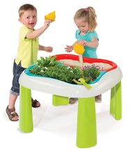 Dětský záhradní nábytek sety - Set stůl Zahradník De Jardinage 2v1 Smoby dvoudílný se zahrádkou a domeček Lovely a vozík s nářadím_10